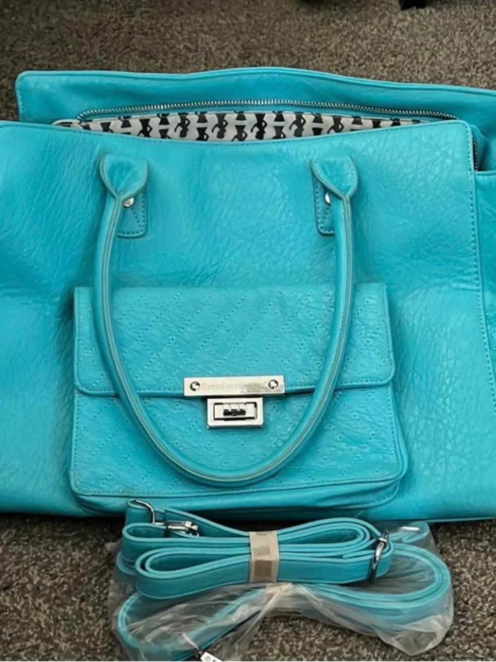 Damsel in Defense Turquoise Shoulder Tote